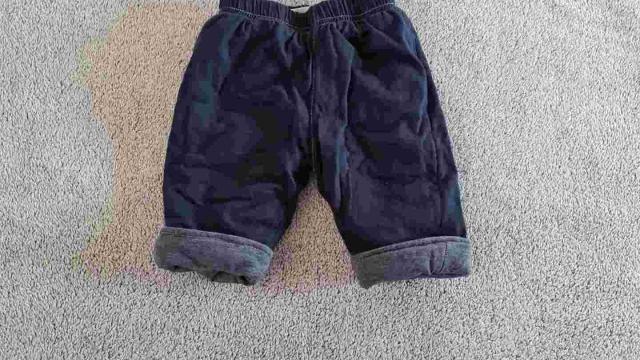 Tmavě modré zateplené kalhoty Topolino vel. 62