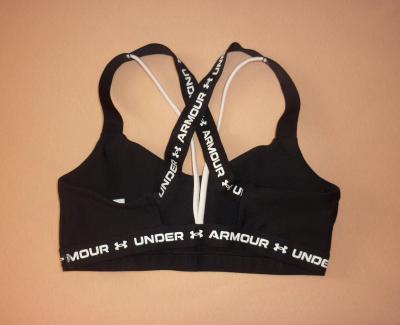Sportovní černá podprsenka Under Armour