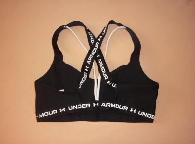 Sportovní černá podprsenka Under Armour